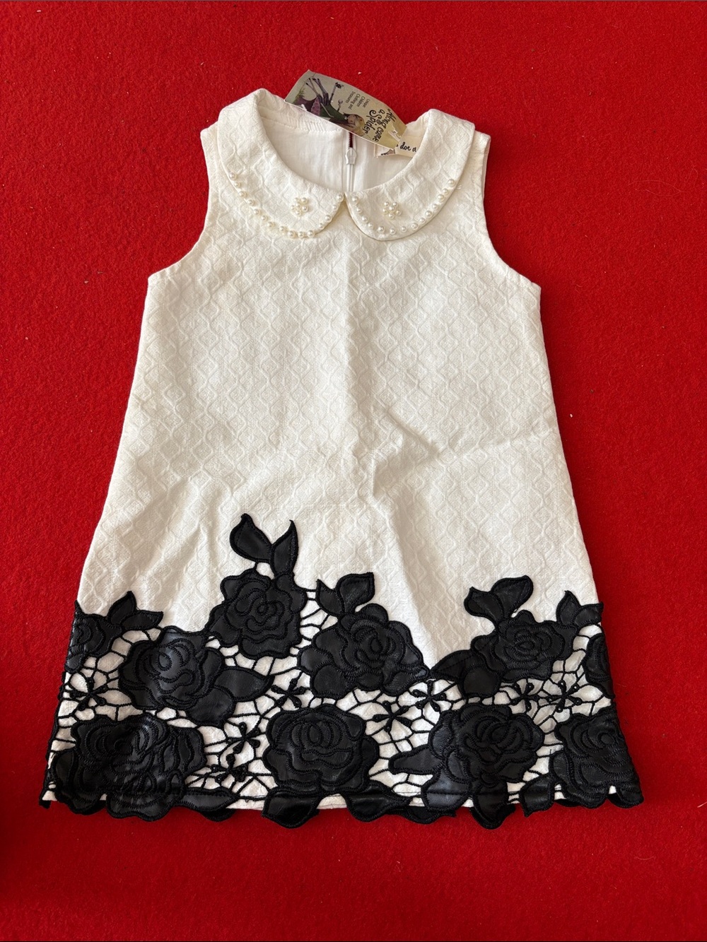 Sleeveless White Girls' Dress with Black Floral Lace Hem